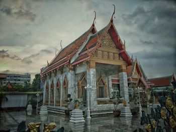 Built structure against cloudy sky