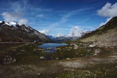 Scenic view of mountains and lake against sky