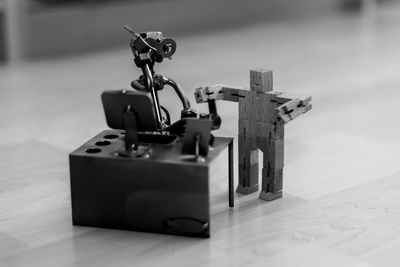 Close-up of telephone on table