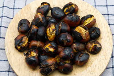 High angle view of roasted coffee beans on table