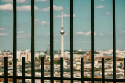 Close-up of railings against sky