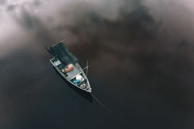 High angle view of boat floating on lake