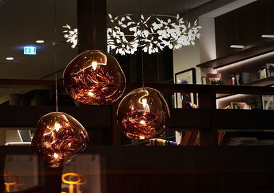 Illuminated lights hanging on ceiling