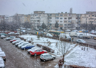 Aerial view of buildings in city during winter