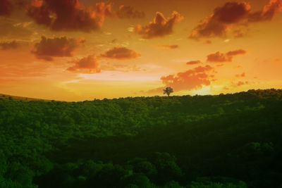 Scenic view of landscape against sky during sunset