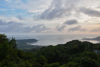 Scenic view of beach and sea against sky