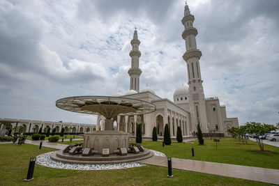 Low angle view of mosque against sky