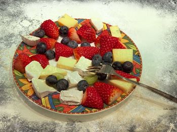 High angle view of strawberries on table