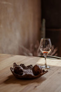 Close-up of wineglass on table