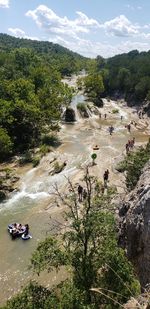 High angle view of people by river