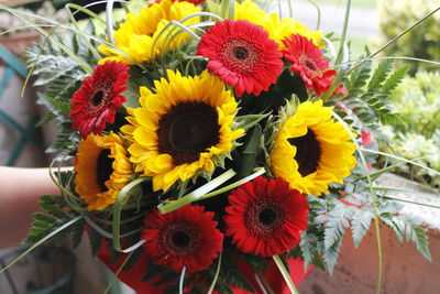 Close-up of hand holding bouquet