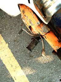 High angle view of rusty car on street