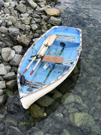 High angle view of abandoned boat moored on shore