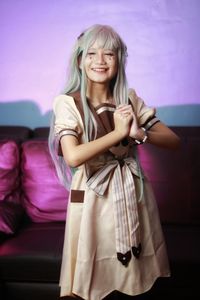 Portrait of a smiling young woman  cosplay