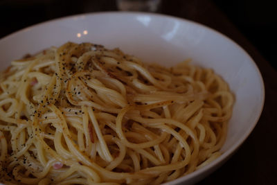 Close-up of noodles in bowl on table