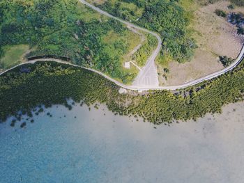 High angle view of winding road on landscape