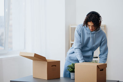 Side view of man working at home