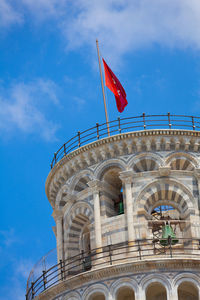 Low angle view of flag against sky