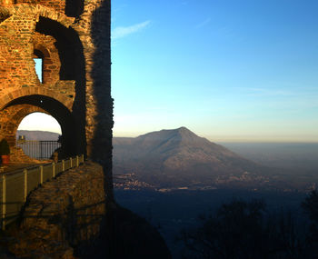 View of historic building against mountain range