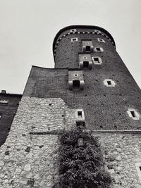 Low angle view of old building against sky