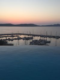 Scenic view of sea against clear sky during sunset