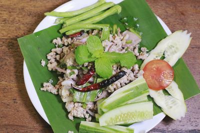 High angle view of fruits in plate on table