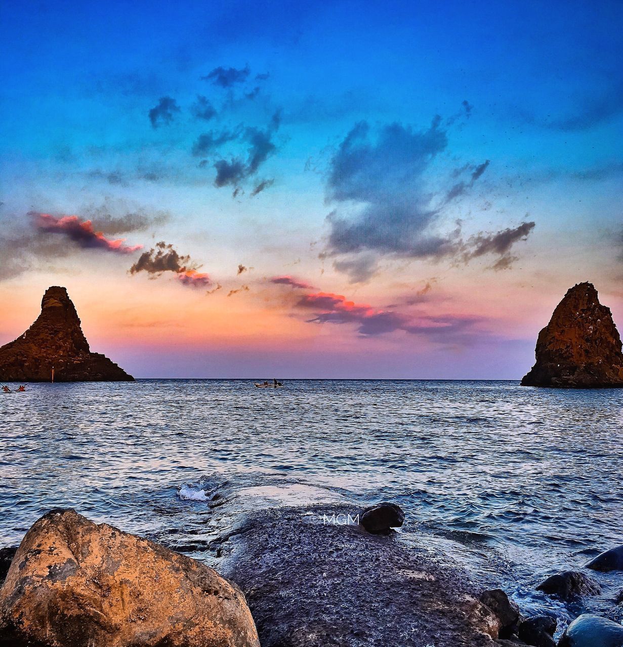 SCENIC VIEW OF SEA AGAINST ORANGE SKY