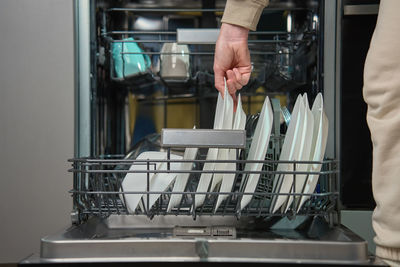 Low section of man working at airport