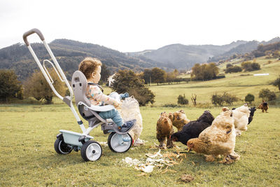 Baby with chicken