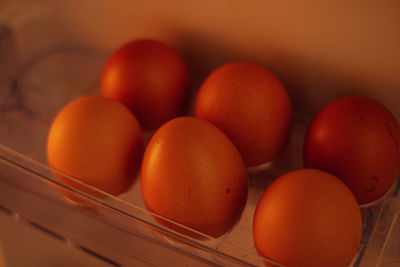 High angle view of eggs in container on table
