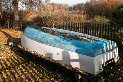 Abandoned metal structure on field