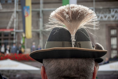 Rear view of person wearing hat