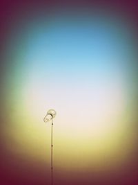 Low angle view of street light against sky