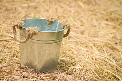 Close-up of hay bales on field