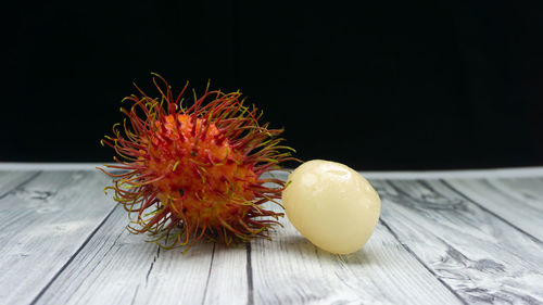 Close-up of orange fruit on table