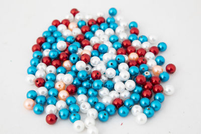 High angle view of multi colored candies on table