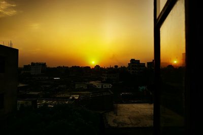 View of cityscape at sunset