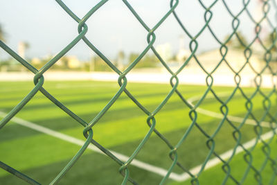 Full frame shot of chainlink fence at playing field