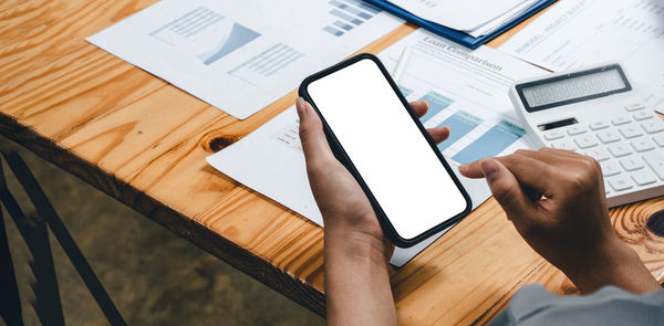 High angle view of person working on table