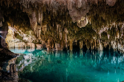 Reflection of rock in water