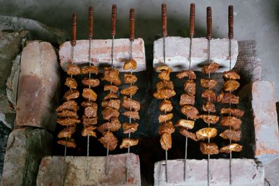 Close-up of meat on barbecue grill