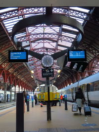 People at railroad station