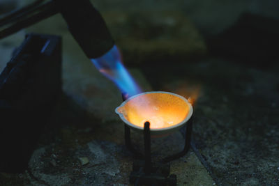Close-up of welding torch burning metal