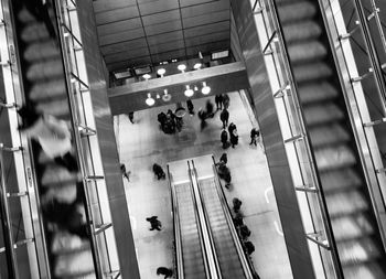 High angle view of people walking in subway