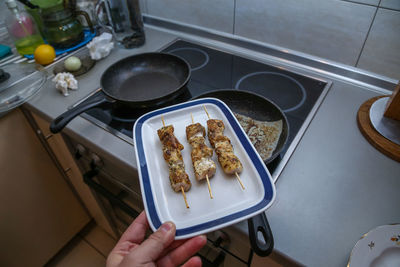 High angle view of person preparing food at home