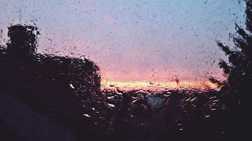 Close-up of water drops on glass