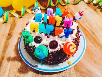 High angle view of multi colored cake on table