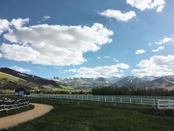 Scenic view of landscape and mountains against sky