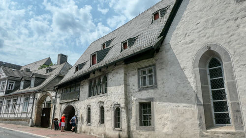 Low angle view of old building against sky