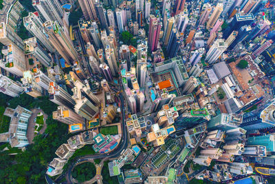 High angle view of illuminated street amidst buildings in city